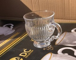 طقم كاسات شكل بطه شفاف محزز سادة من الاعلى مع يد وقاعدة 12 قطعة